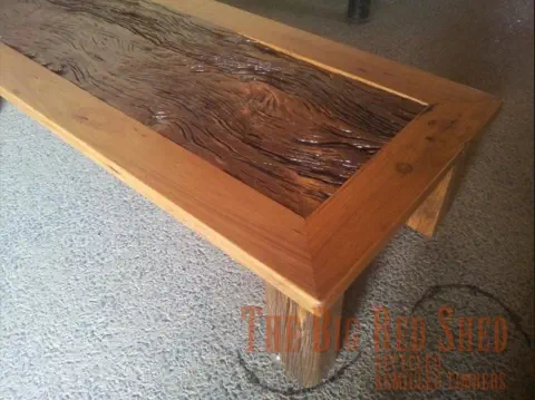 Solid low coffee table with inlay